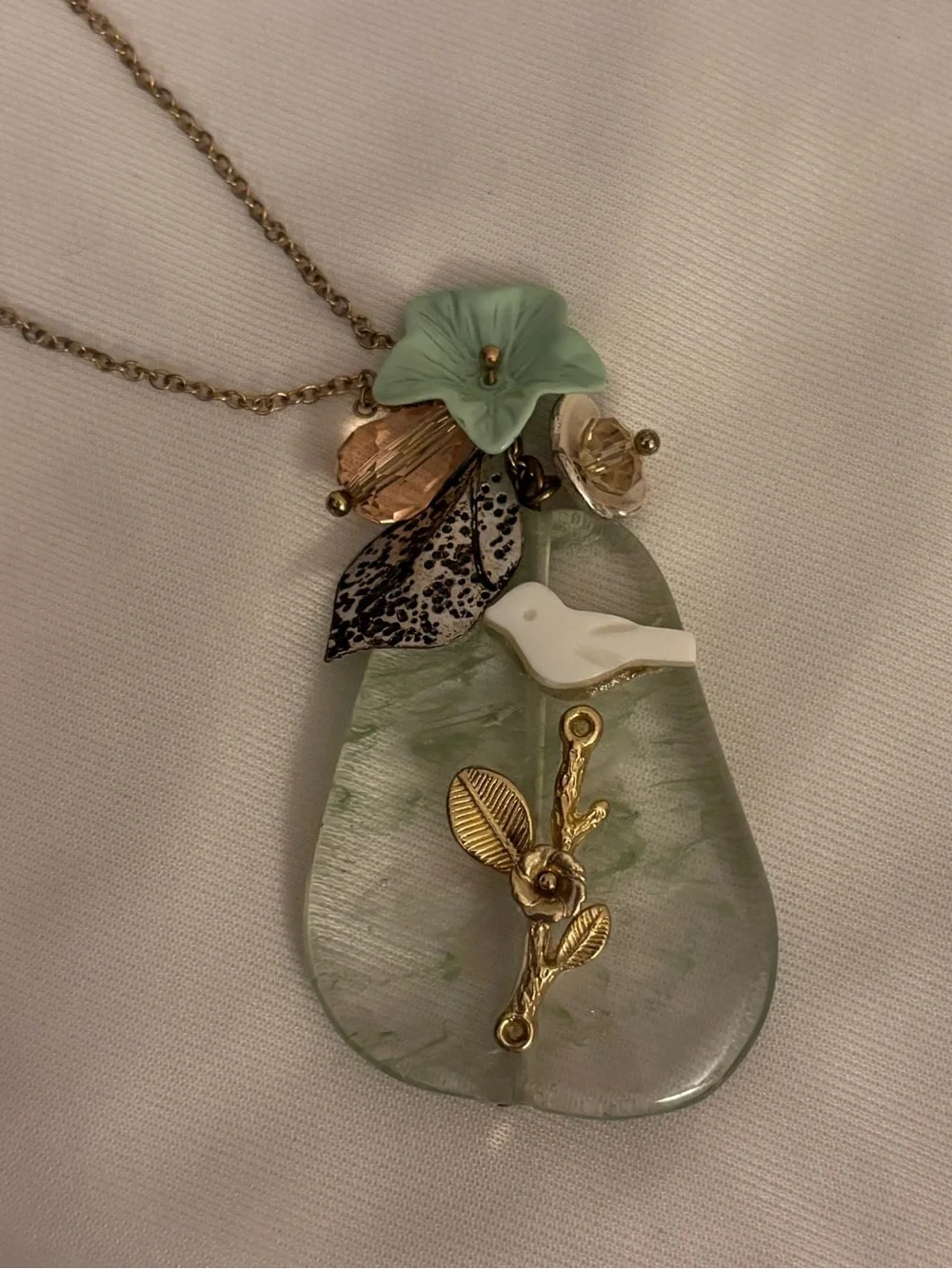 Gold-Chain Green Stone Pendant Necklace with Bird and Leaf Charms